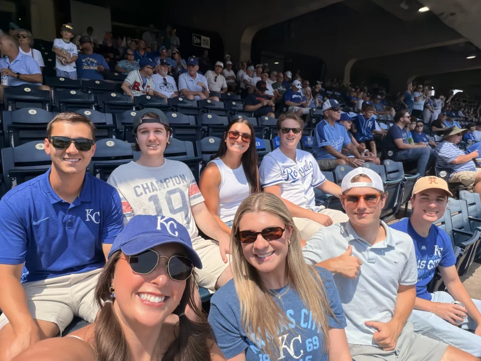 Group selfie in the stands at a Kansas City Royals game